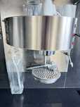 Maquina de cafe em parede