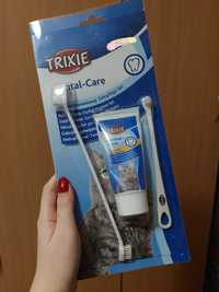 Зубна паста і дві щітки для котів