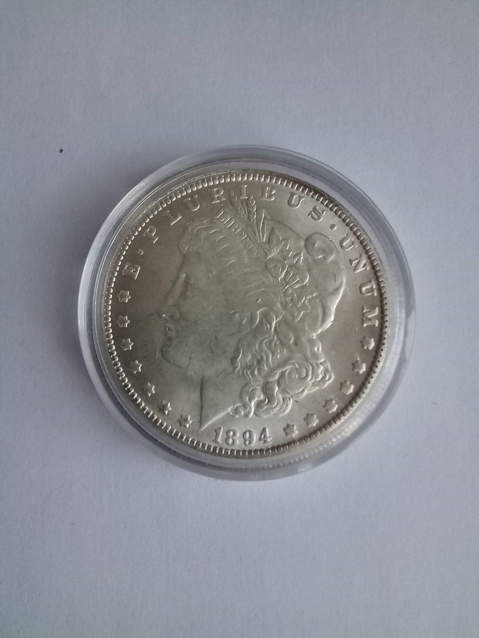 Срібний долар 1894 року.