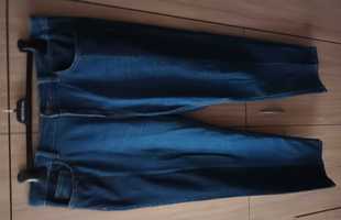 Spodnie damskie roz. 42 firmy Orsay połączone dwa kolory dżinsu