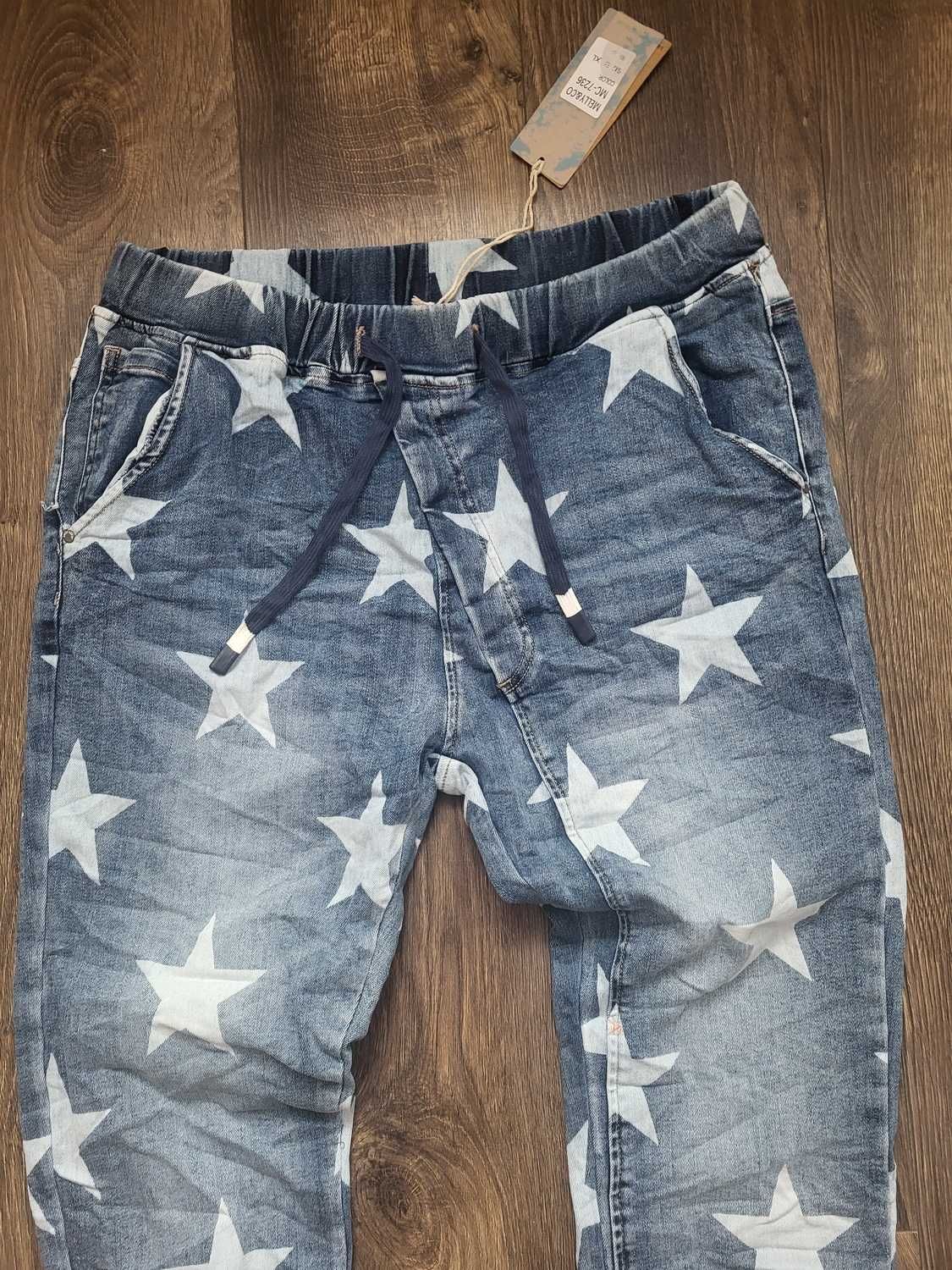 Spodnie jeans z gwiazdami 42