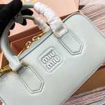 MIUMIU akwamarynowa torba bowlingowa - elegancja
