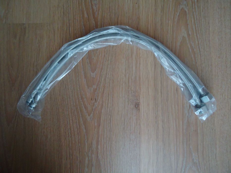 Новые запечатанные водные шланги от смесителя "Grohe", дёшево.