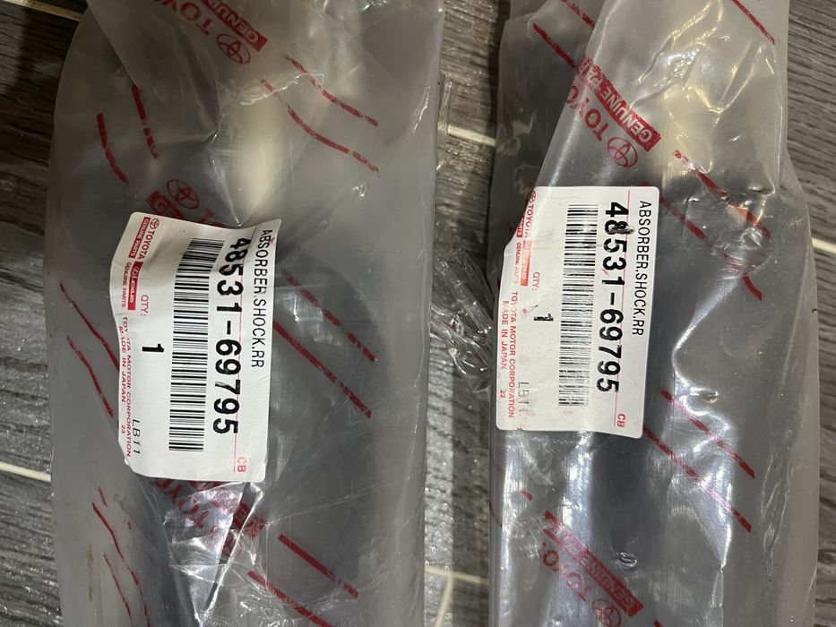 Тойота Land Cruiser 100 задні амортизатори Орігінал, Нові