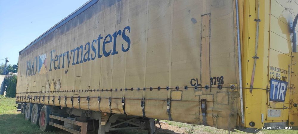 Продаж напівпричіп бортовий тентований, SCHMITZ S01