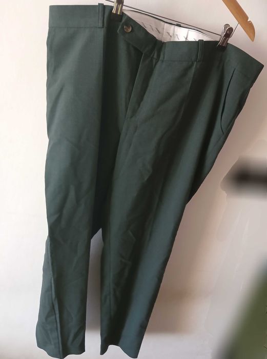 Eleganckie spodnie butelkowa zieleń prawie nowe