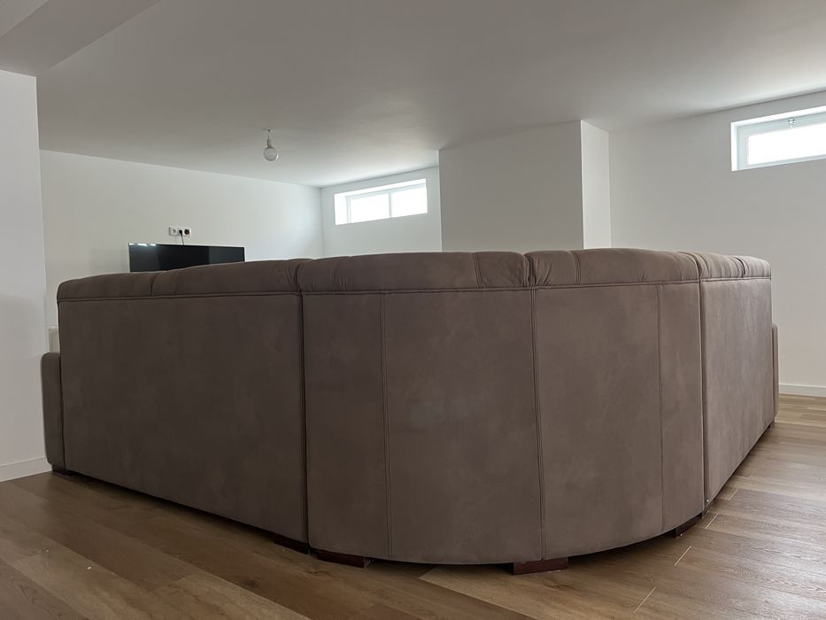 Sofá de canto cinzento