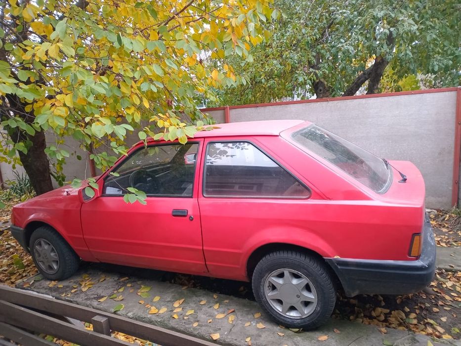 Форд ескорт газ бензин