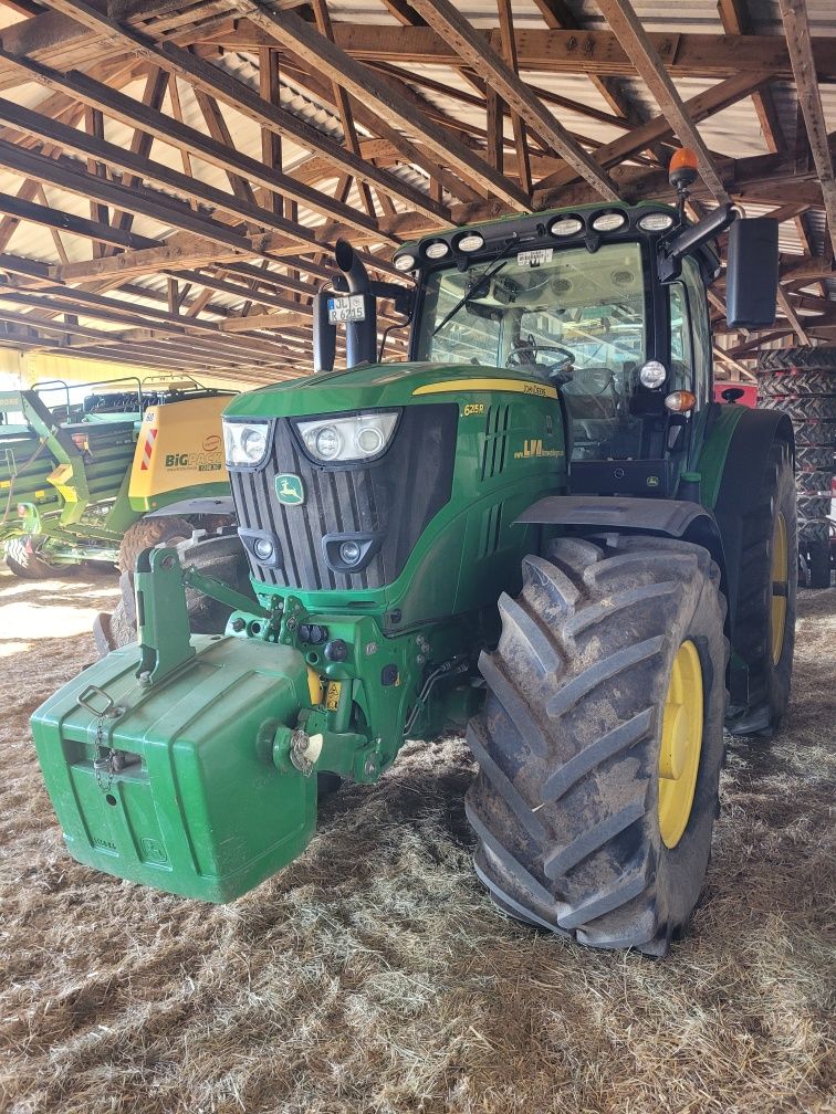 John Deere 6215R z Niemiec