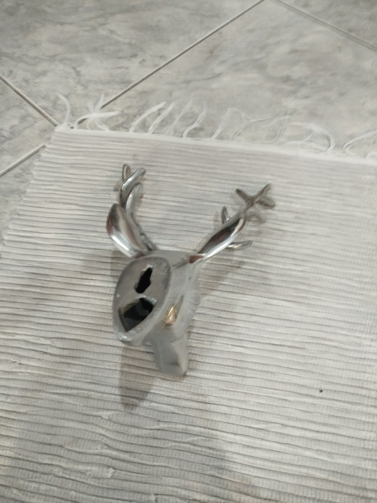 Cabeça de veado em alumínio polido