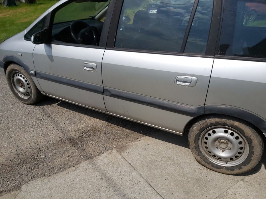 Drzwi lusterka  szyby zamki klamki zafira
