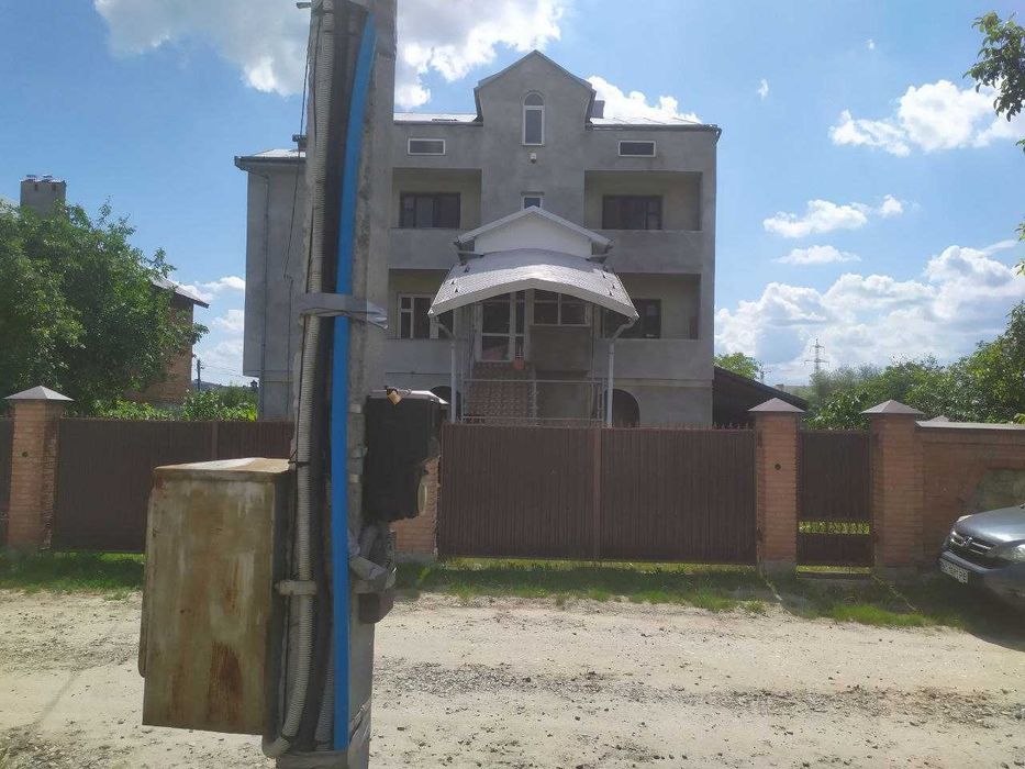 Половина спареного будинок з гаражем у Винниках