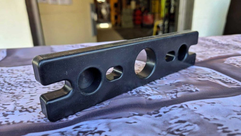 Mocowanie do prowadnic stosu na pręty fi 20mm