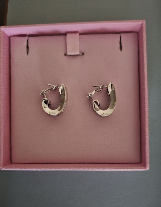 Brincos de mola em ouro branco