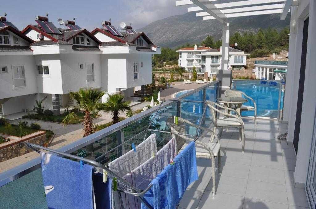 Аренда апартаментов 2+1, 90 м.кв. Личный сад с барбекю.Олюдениз,Турция
