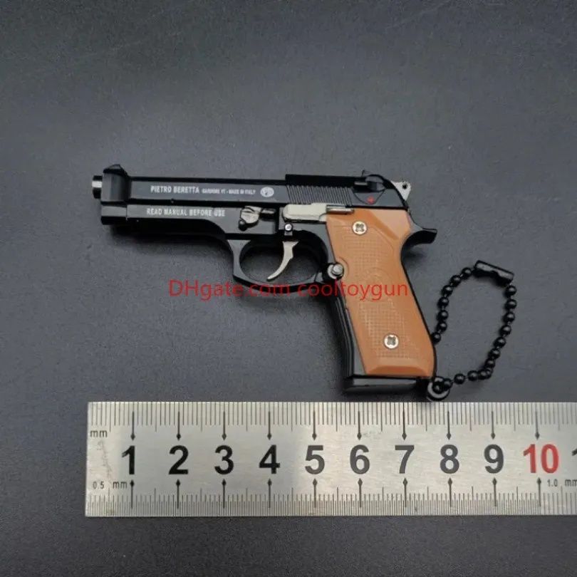 Escala 1:3  GLOCK 17/ Beretta M92  metal replica á real, não dispara