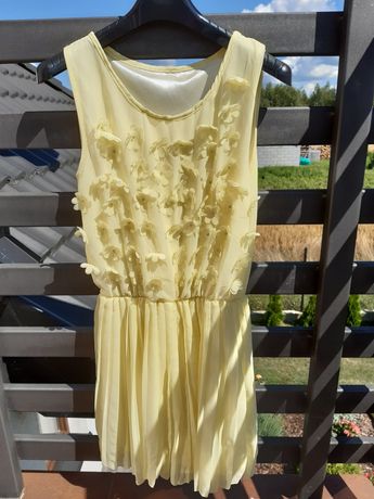 Śliczna letnia zwiewna sukienka plisowana 152