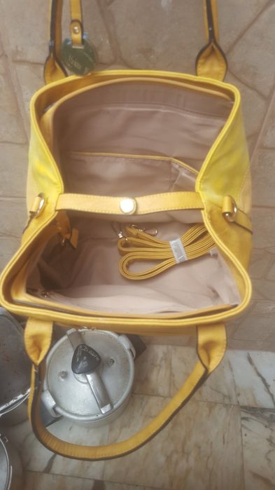 Saco em pel para  Senhora  novo  dá  para  levar  a mão  ou de  tiraco
