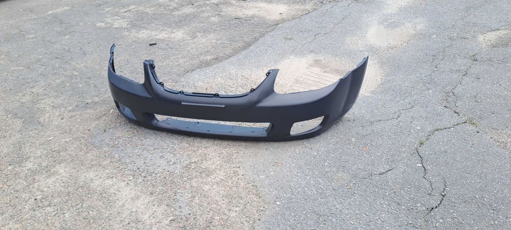 Бампер Kia Cerato 06–09 р