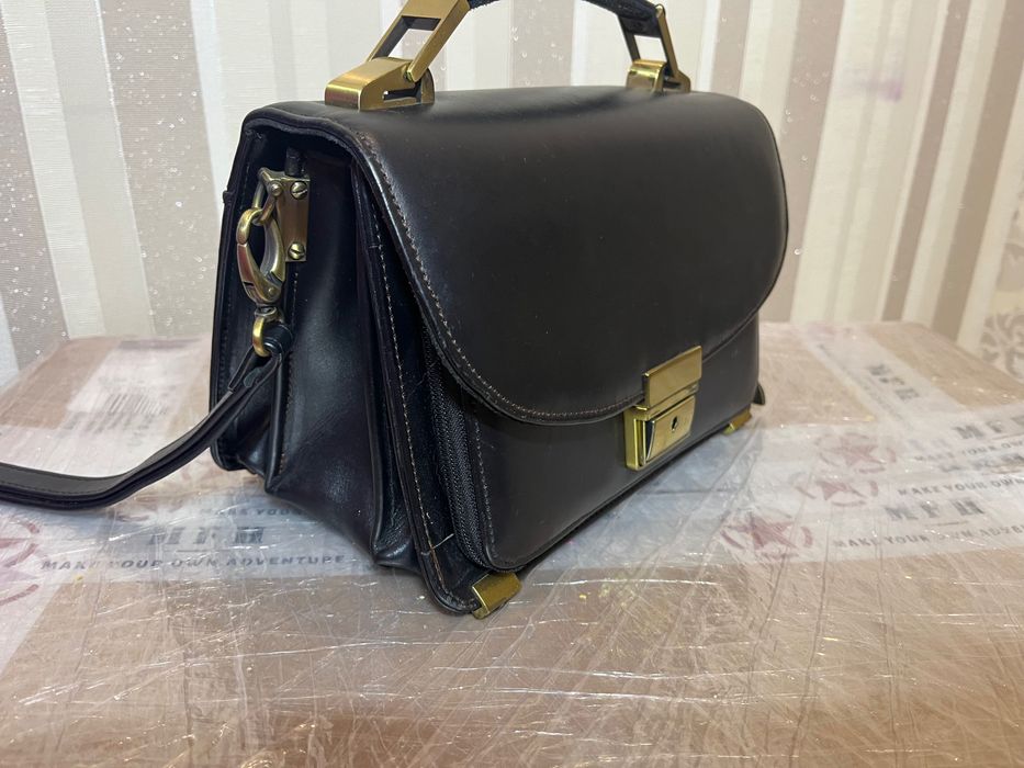 Барсетка чоловіча шкіряна.