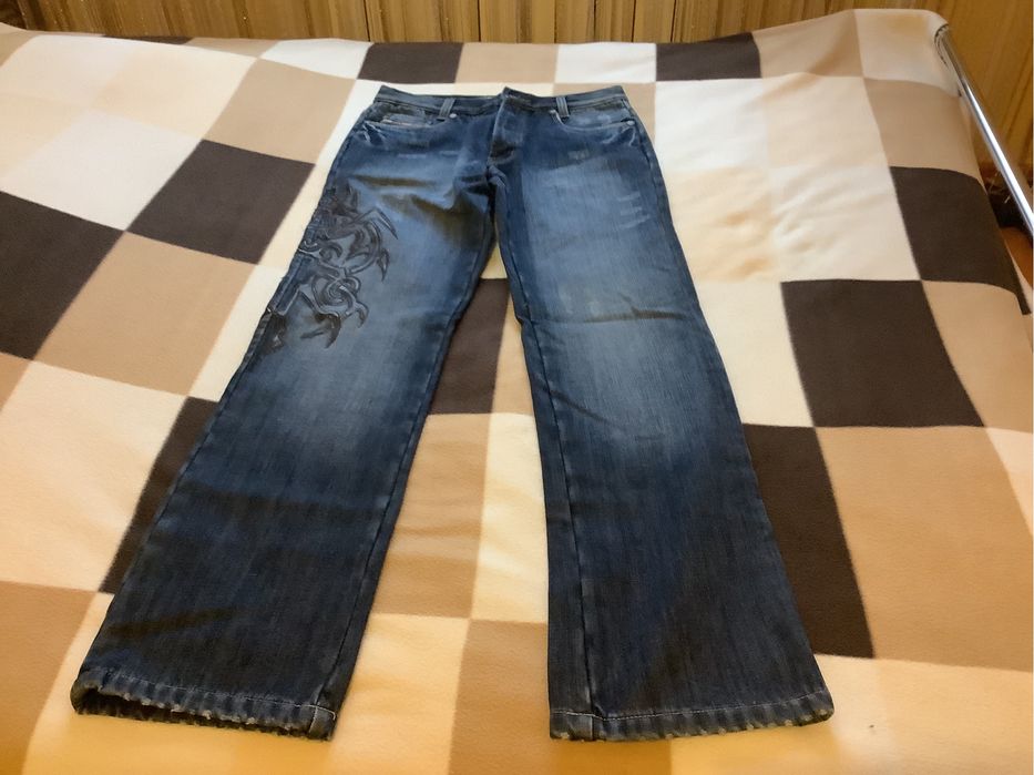 Джинсы зимние, c аппликацией и  вышивкой, новые 5 фото