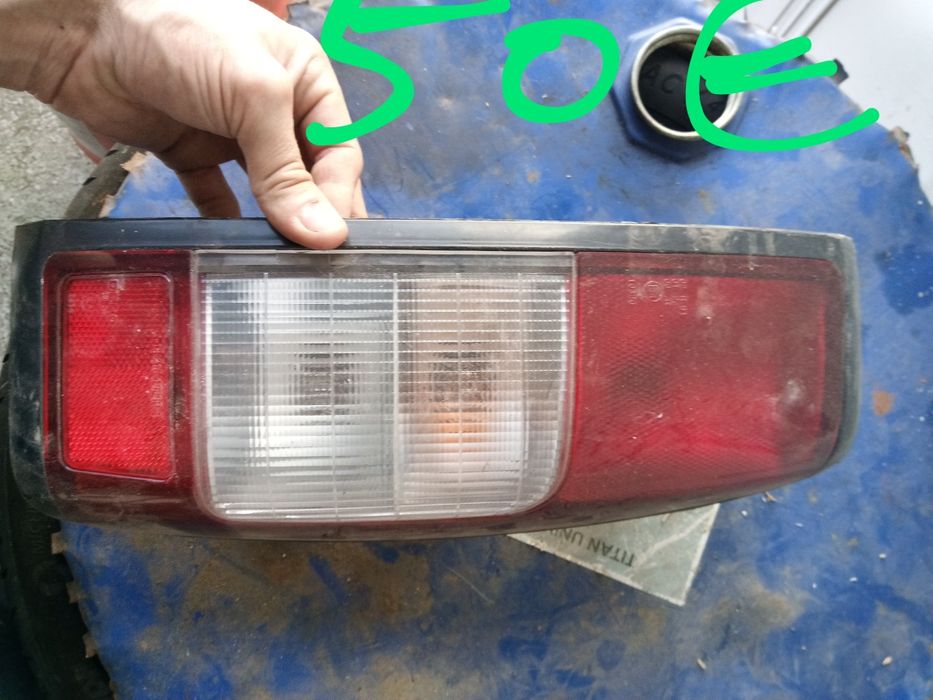 Farolim stop Nissan d22