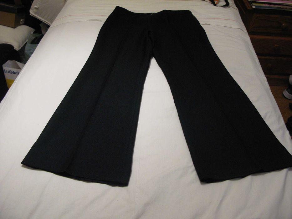 Calças clássicas de senhora