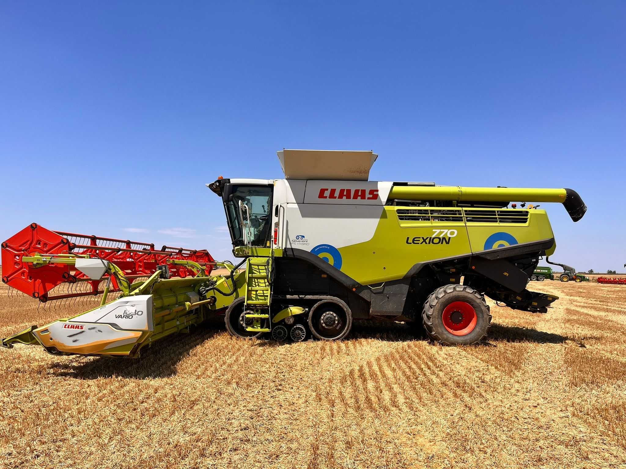Claas Lexion 770TT, 2014 rok - 2450 godzin, autopilot, header V1050