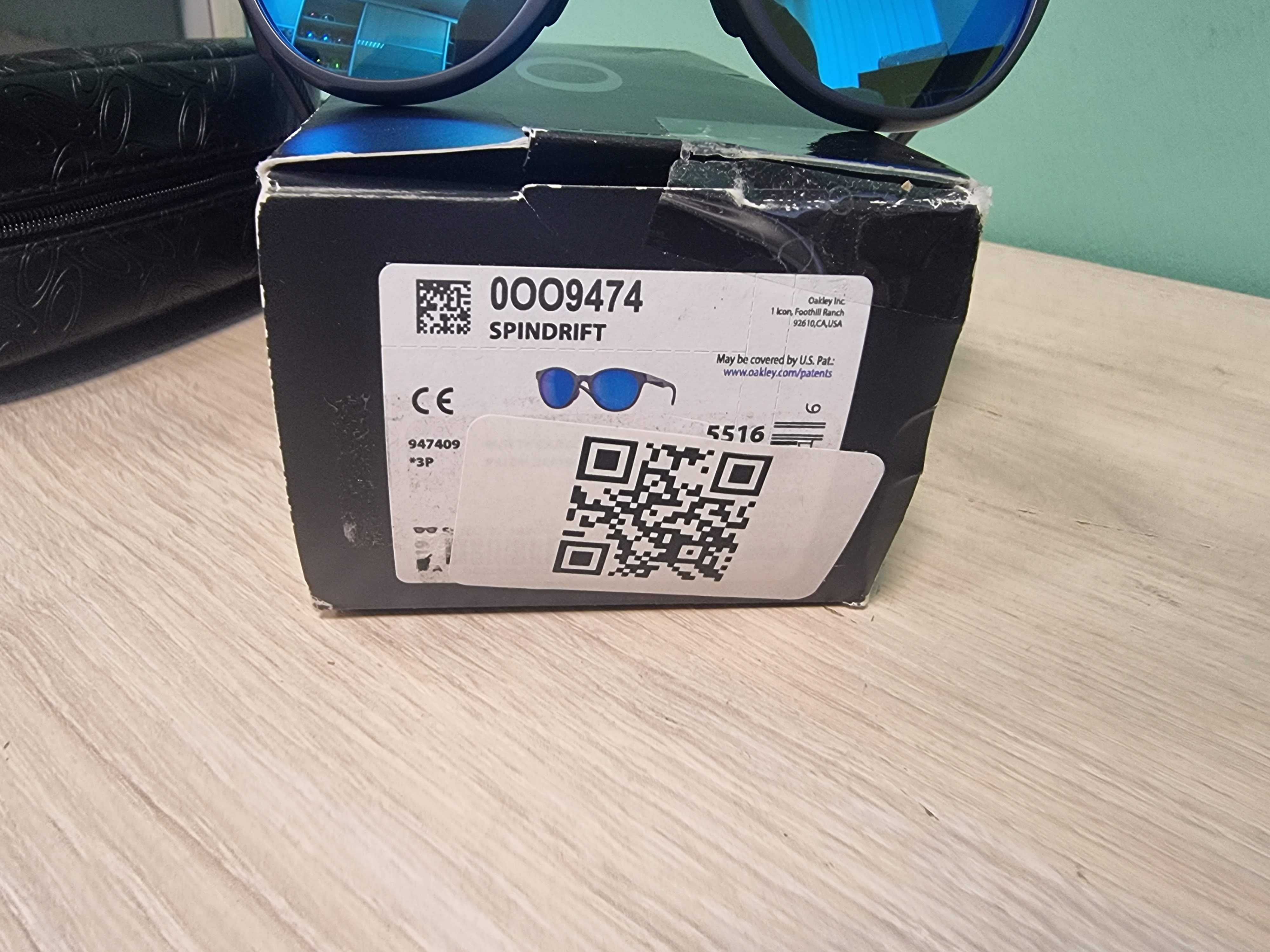 Окуляри жіночі Oakley Spindrift Matte Carbon Prizm Sapphire Polarized