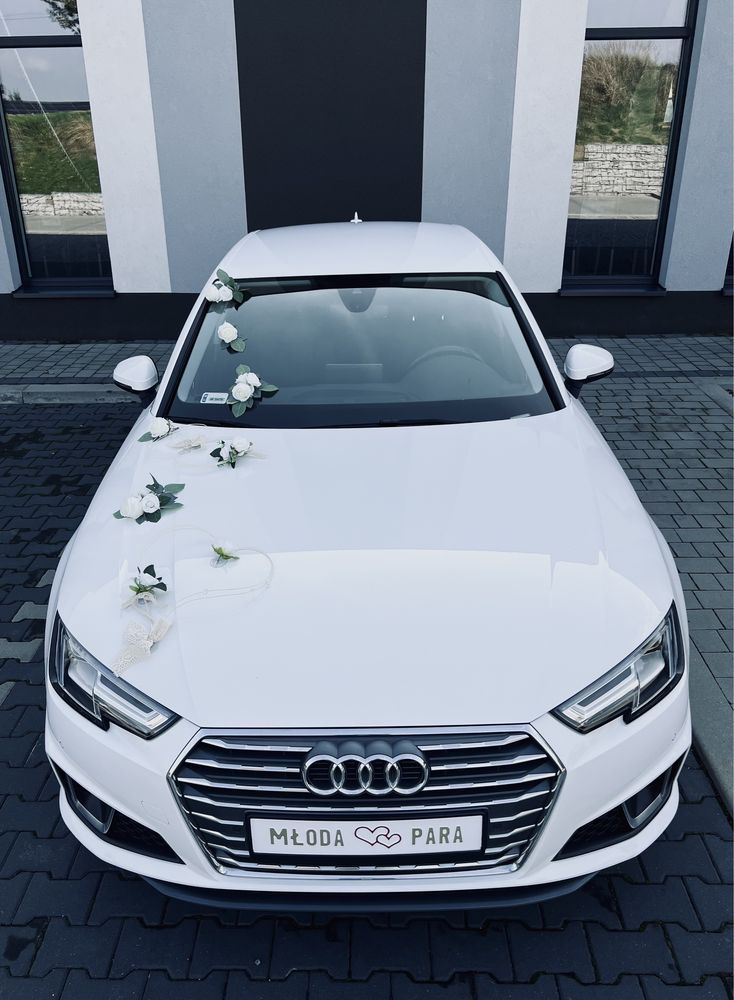 Samochód do ślubu eleganckie białe Audi Sedan A4 S-Line udekorowane