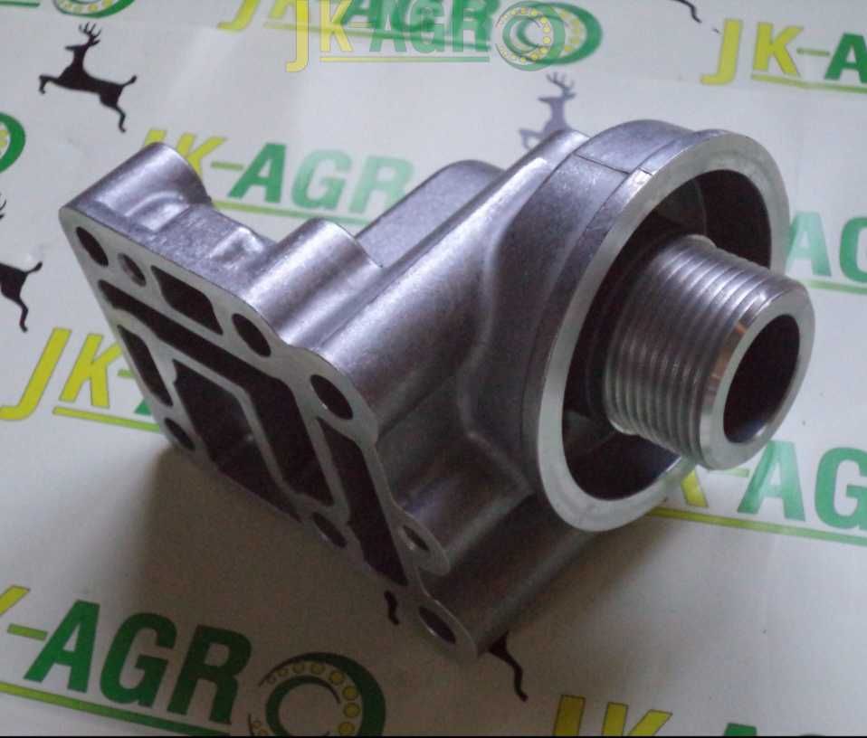 Obudowa filtra oleju skrzyni Power Quad John Deere R555743 R95850