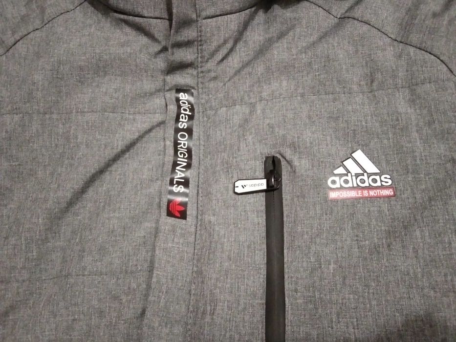 Куртка зимова сіра майже нова, б/в 1 раз, р.48, в ідеалі