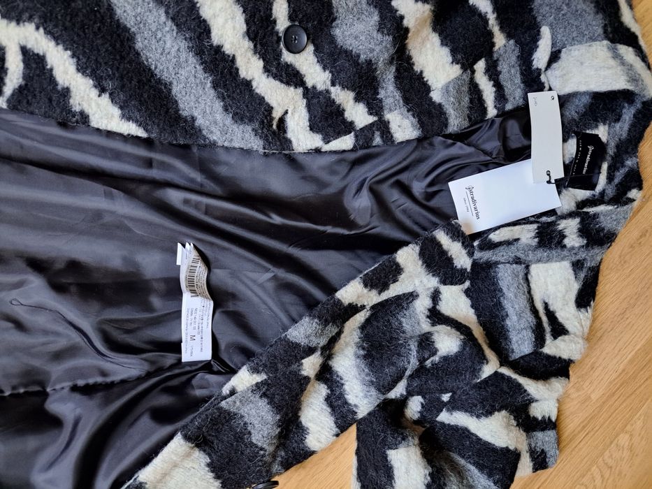 Продам стьобану подовжену куртку Reserved