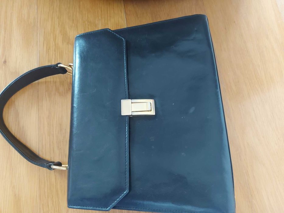 Malote de mão em pele