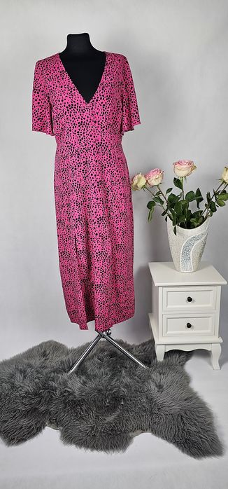 Piękna sukienka różowa Rozmiar 42 xl panterka