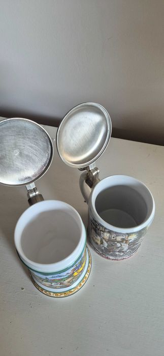 Dwa ceramiczne kufle do piwa z cynowymi przykrywkami