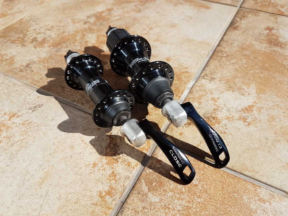 piasty Shimano DEORE LX, FH-M565, HB-M563, 32H + zaciski, stan BDB