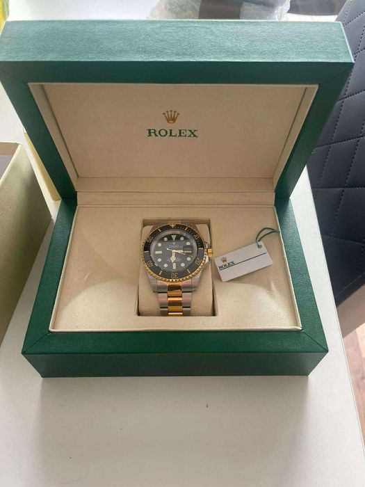 Zegarek Rolex czarno-złoty, stan doskonały