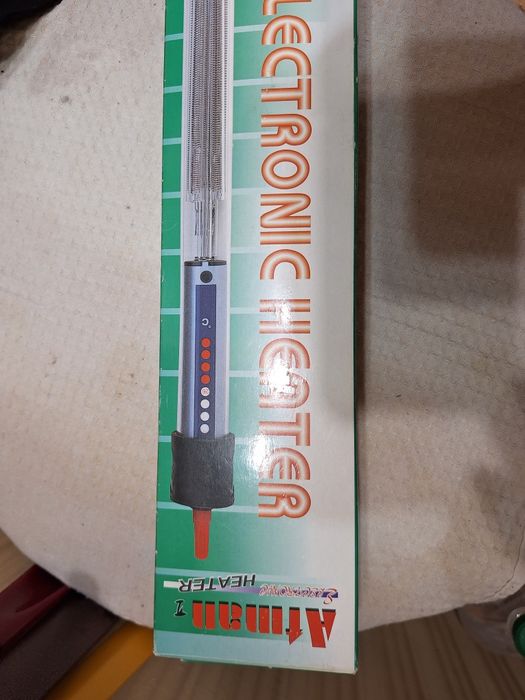 Продам обогреватель для аквариума с терморегулятором.