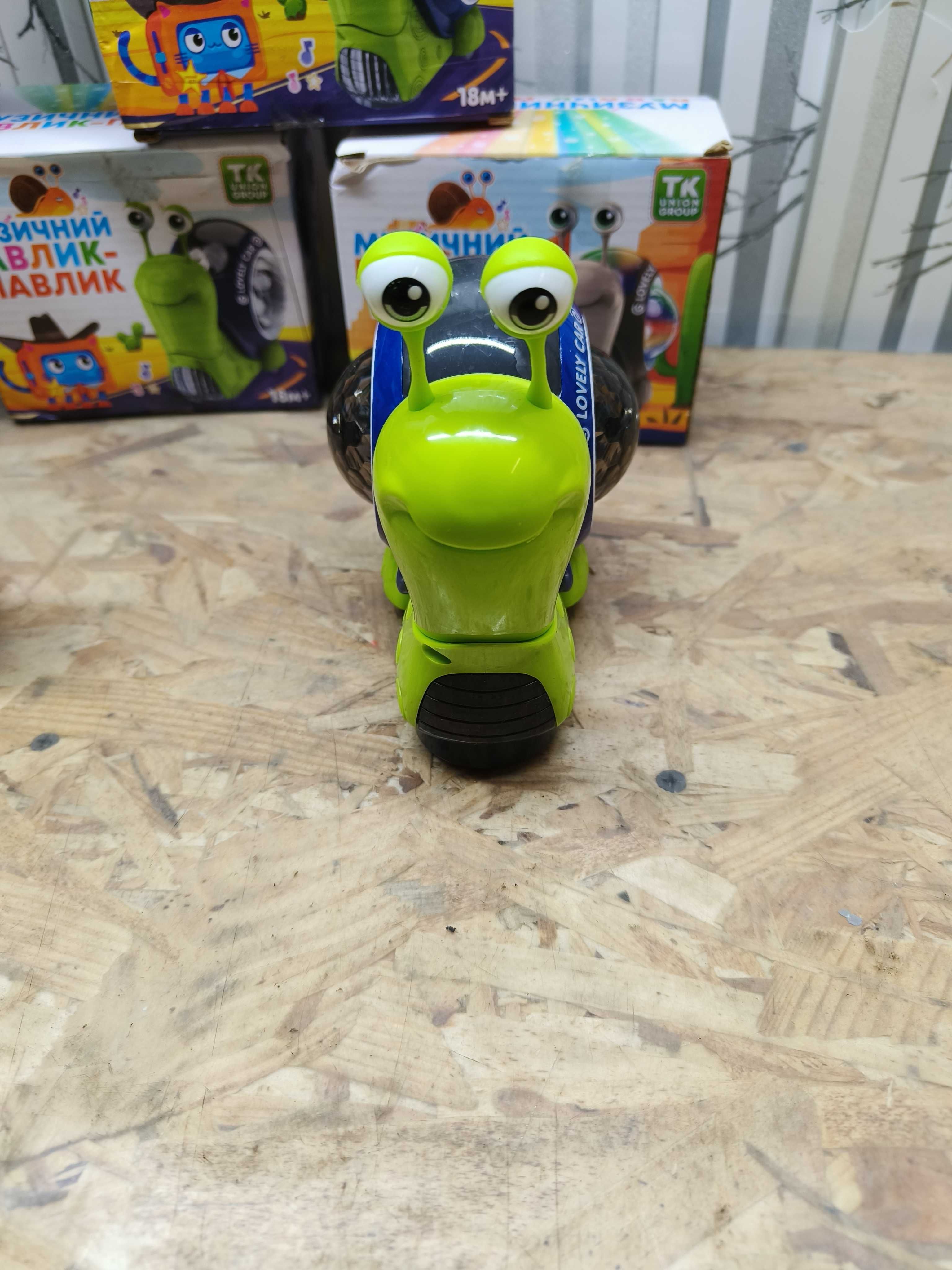 Музична іграшка Равлик-павлик (світло, звук, проектор, рухома голова