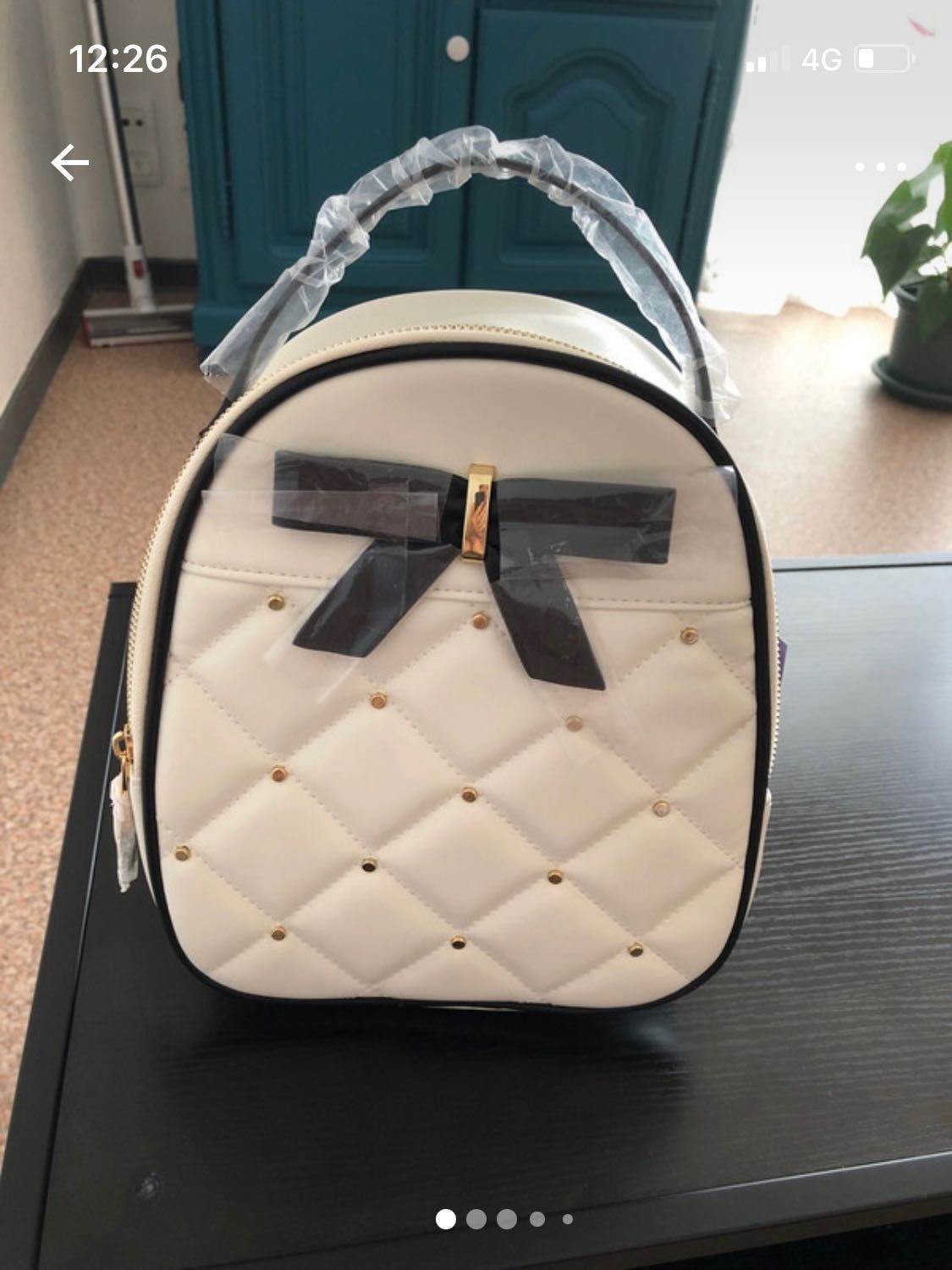 Mochila beje e preta