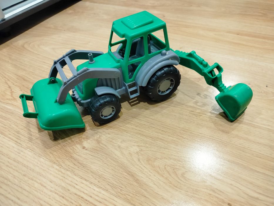 Машини будівельні, трактори великі з рухомими частинами