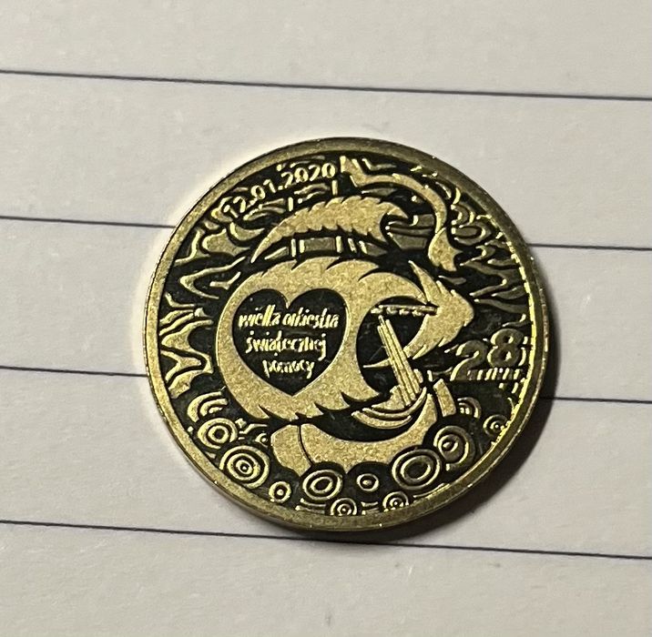 Moneta pamiątkowa z WOŚP z 28 finału.