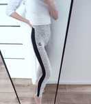 Legginsy białe w kropki lampas czarny po boku Puma wysoki stan