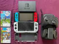 Nintendo Switch HAC-001 32GB + 2 Gry + akcesoria