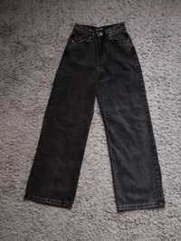 Чорні джинси кльош