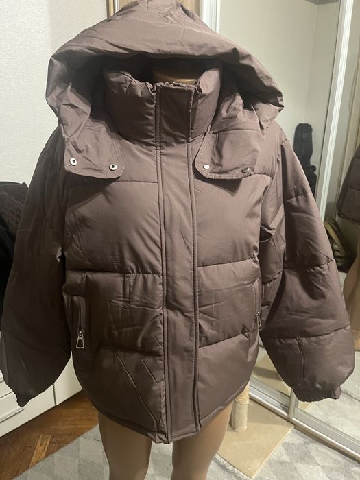 Пуховик,куртка шоколадного кольору.