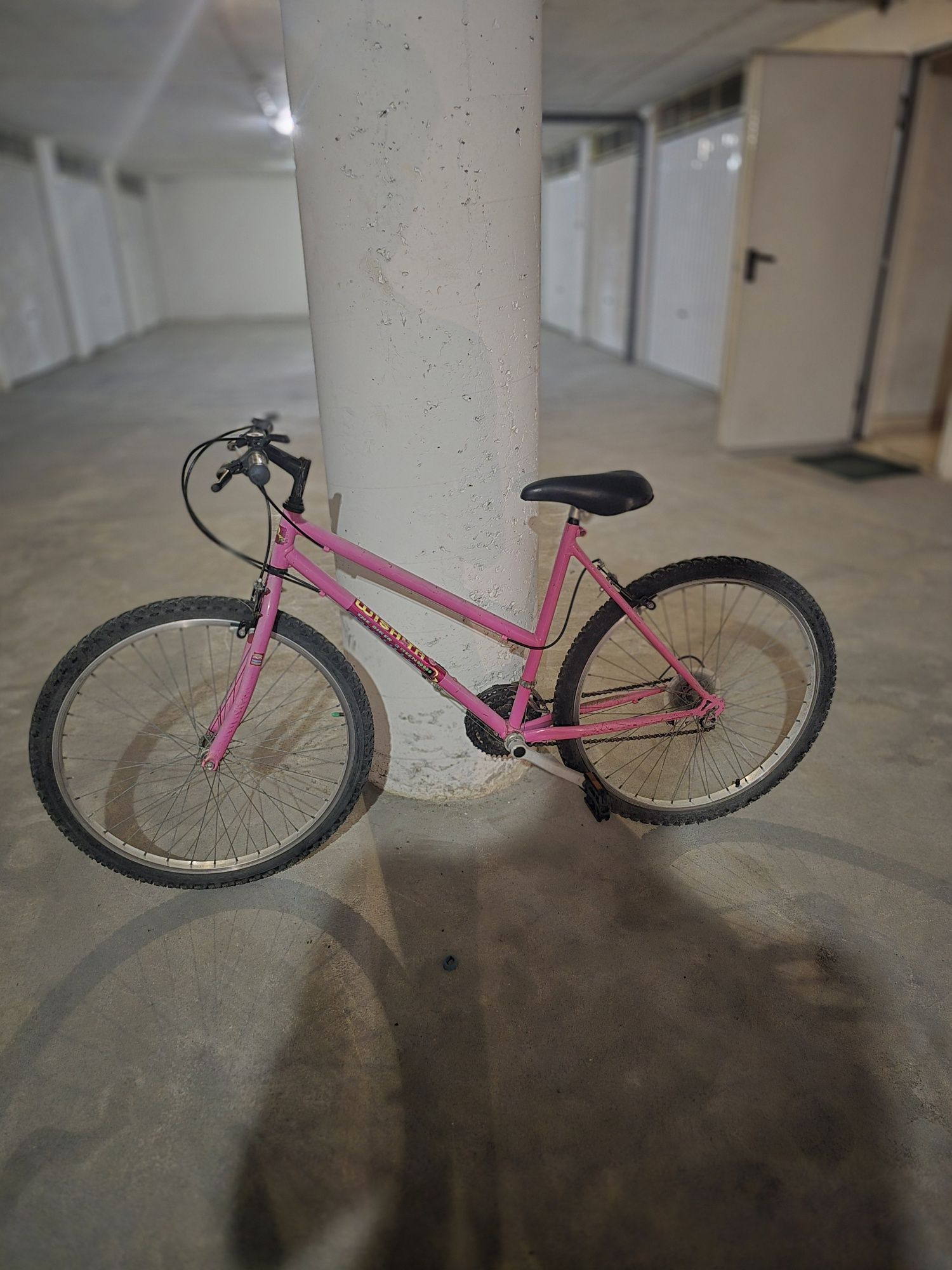A tua bicicleta cor de rosa