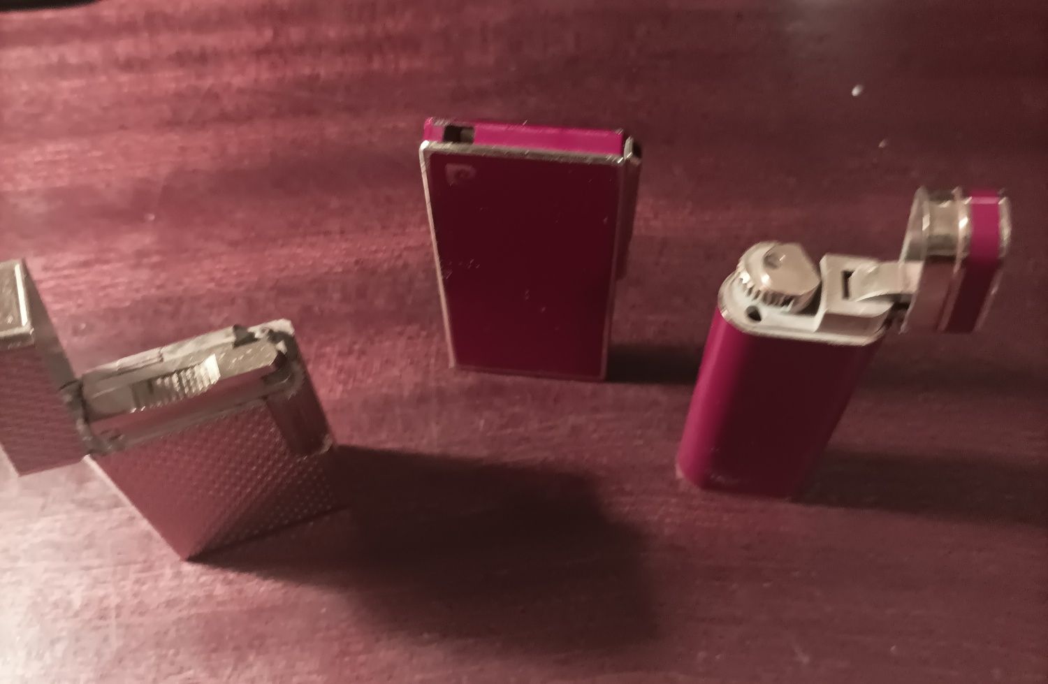 Três isqueiros coleção, St. Dupont, Cartier e Pierre Cardin