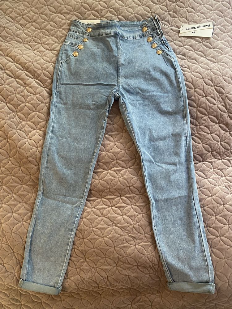 Spodnie jeansy rozmiar L nowe